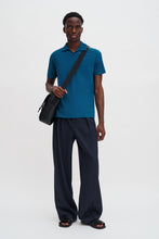 Laden Sie das Bild in den Galerie-Viewer, Polo-T-Shirt aus Stretch-Baumwolle, Night Teal
