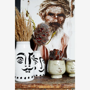 Flower pot w/ face imprint