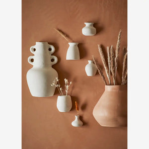 Wall-mounted paper mache vases